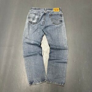 Men's vintage style Levi's 505 light wash distressed essential denim jeans pants